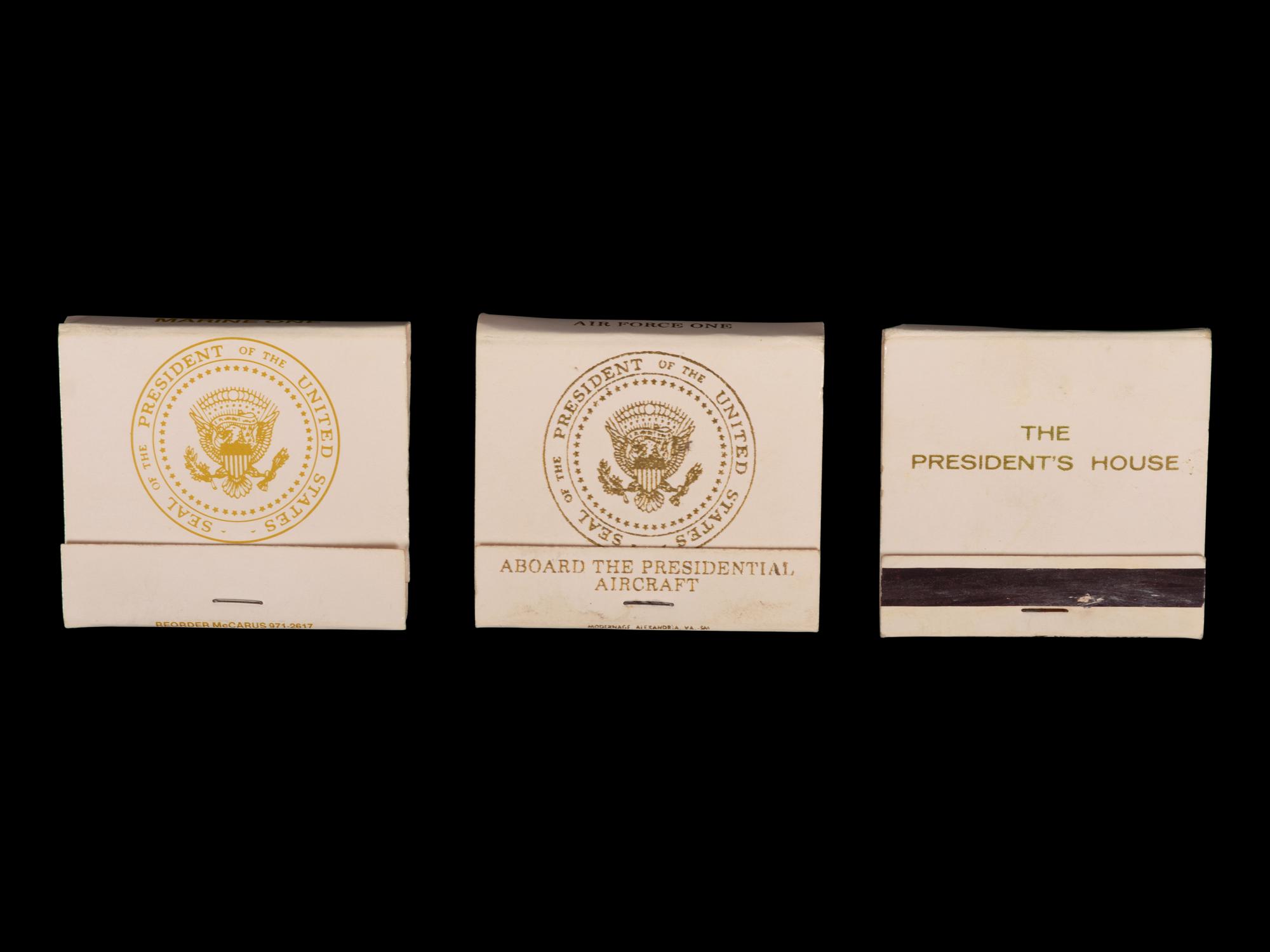 (Politics) : A group of 3 matchbooks from Marine One, Air Force One, and “The President’s House.”