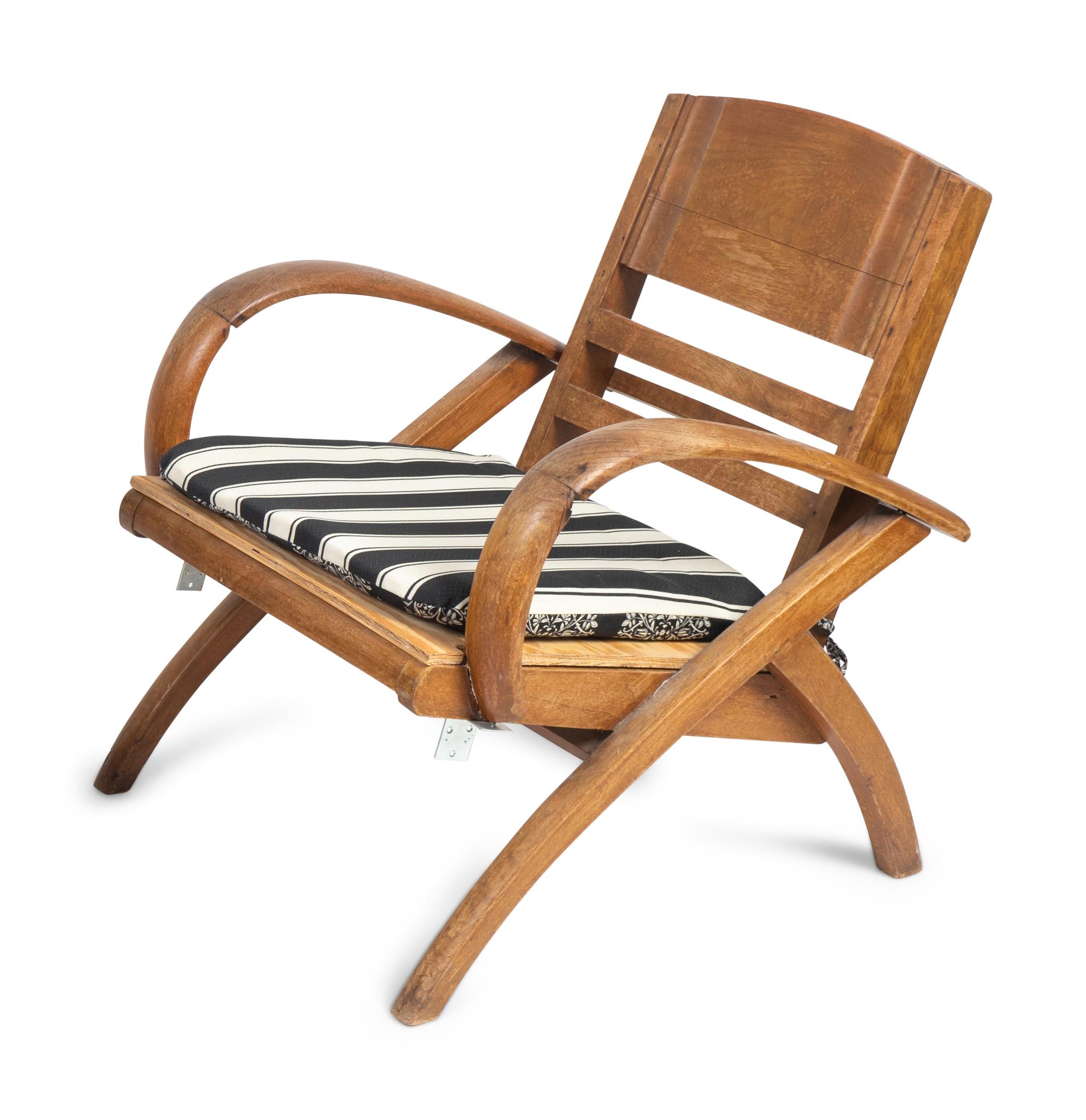 A Pair of British Colonial Teak Open Armchairs — FIRST QUARTER 20TH CENTURY