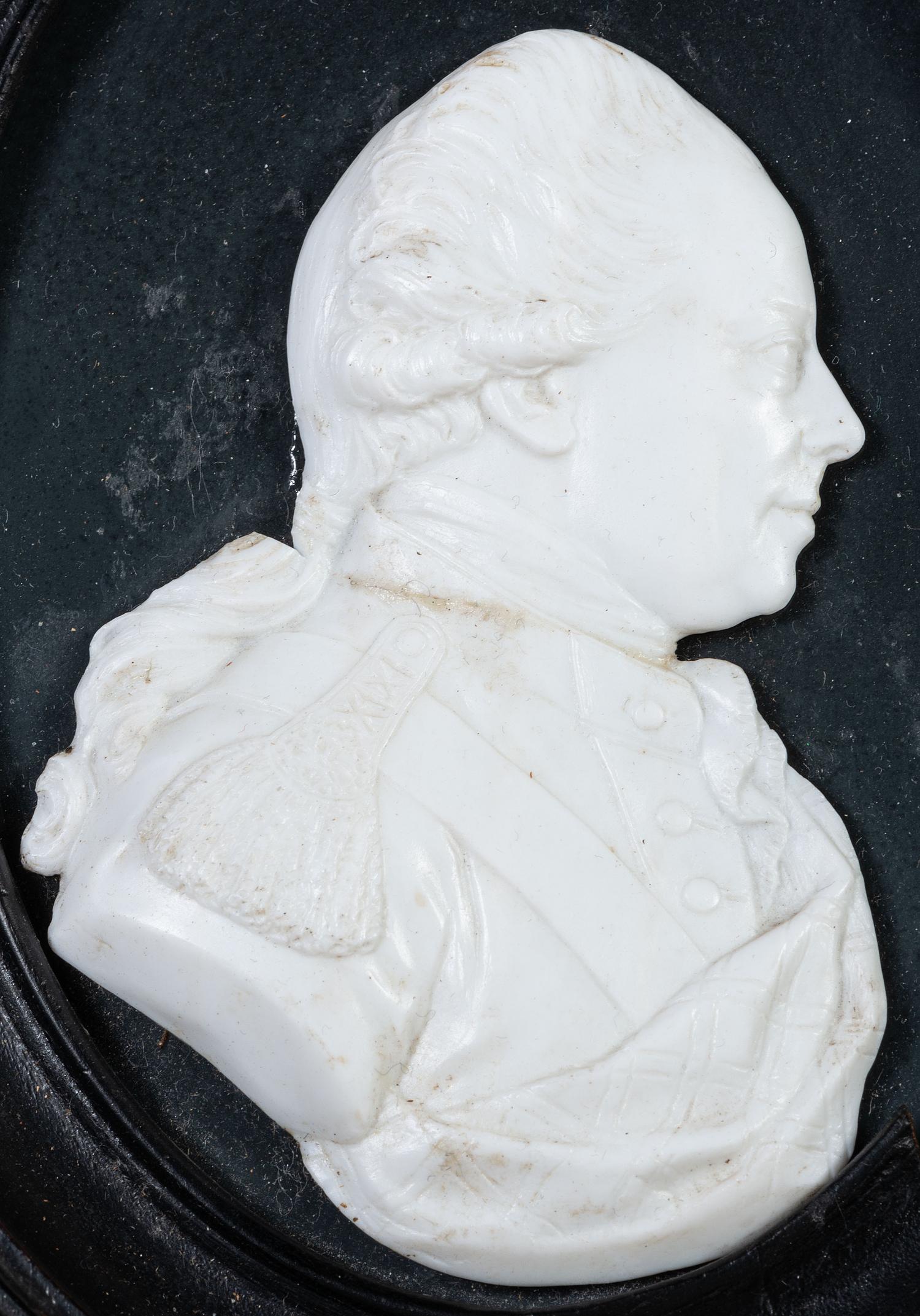 Two English White Paste Silhouette Bust Portraits of a Lady and a Gentleman