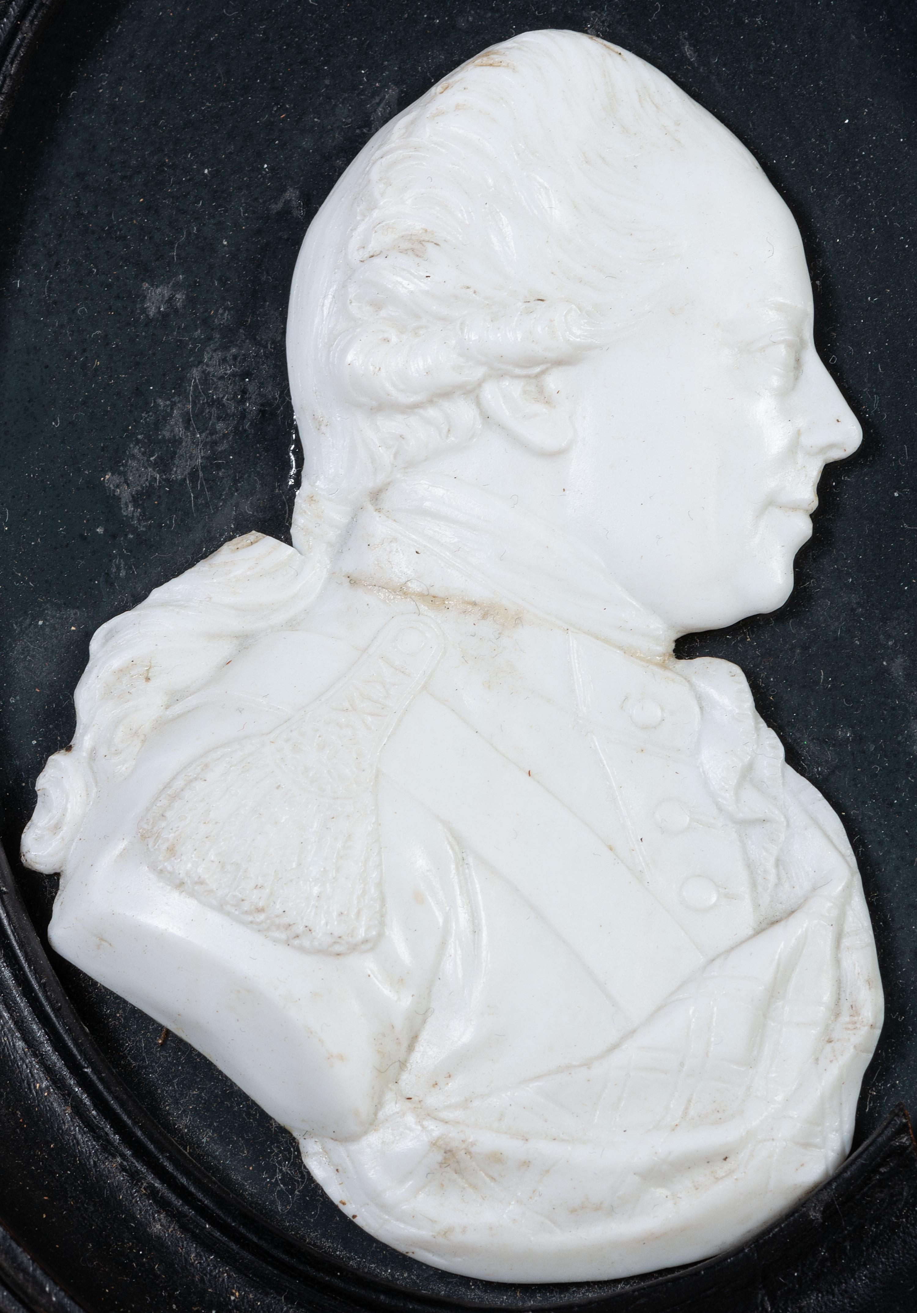 Two English White Paste Silhouette Bust Portraits of a Lady and a Gentleman