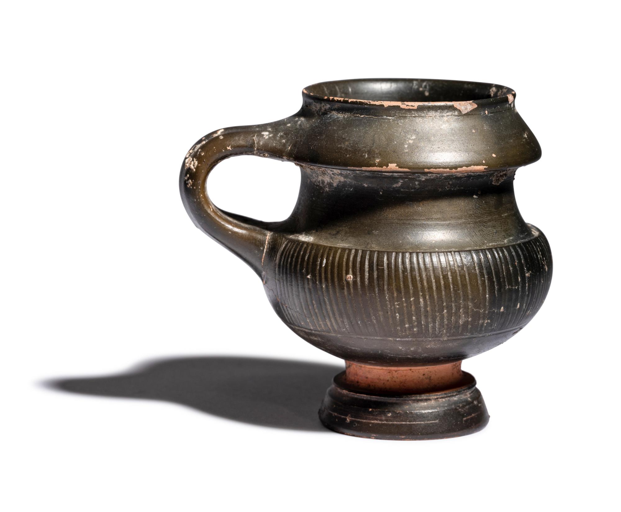 An Apulian Black-Glazed Oinochoe