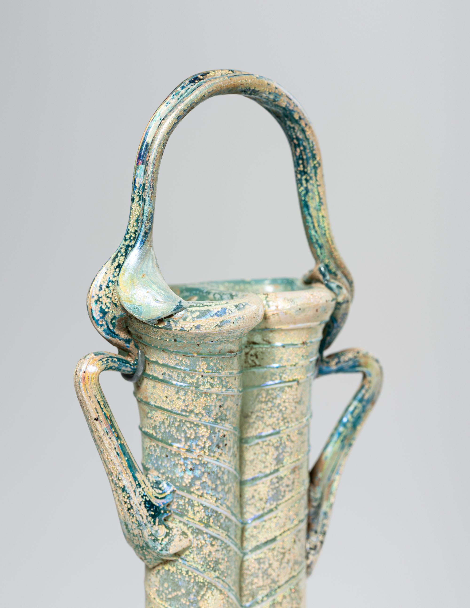 A Roman Green Glass Double Unguentarium