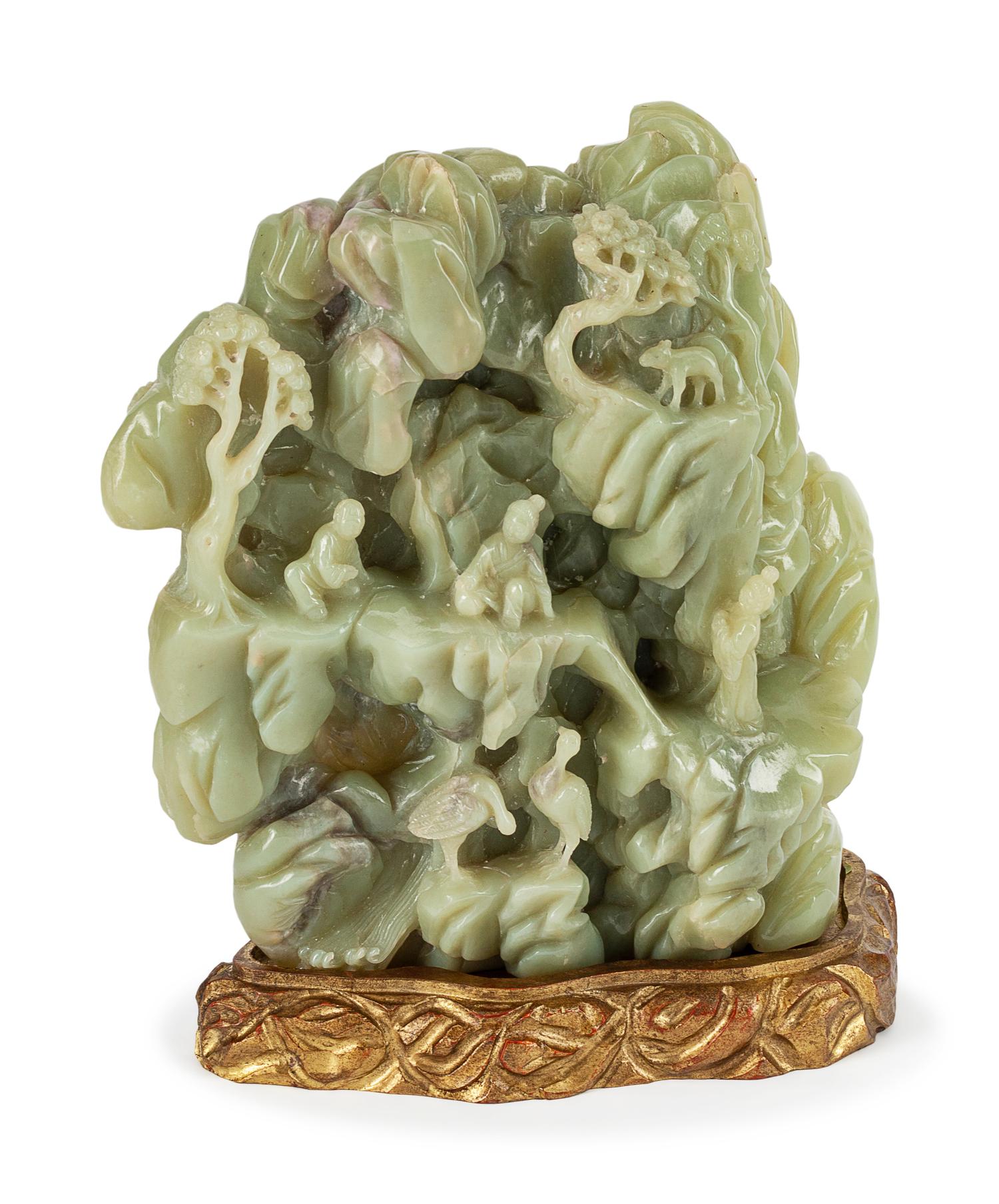 A Chinese Carved Jadeite Figural Group