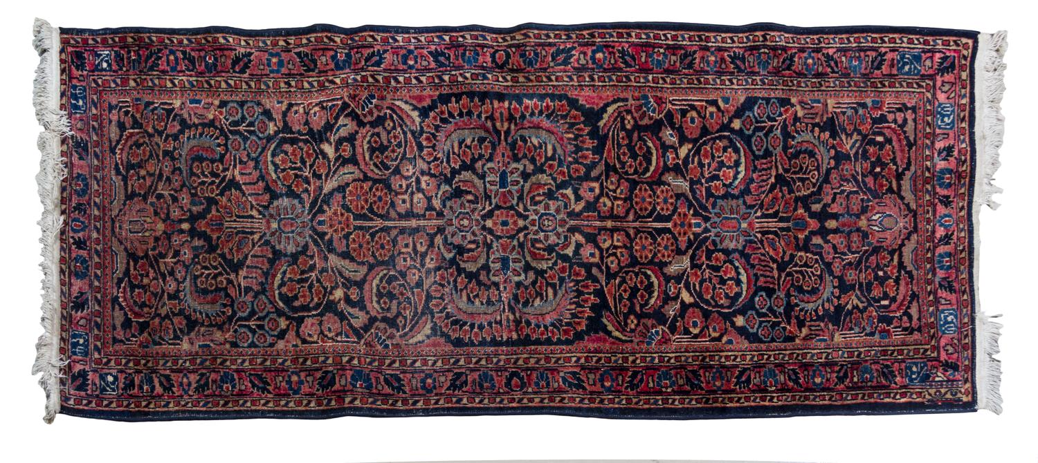 A Sarouk Wool Runner, 2ND QUARTER 20TH CENTURY, 6 feet 7 inches x 2 feet 7 1/2 inches. — 2ND QUARTER 20TH CENTURY