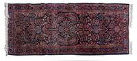 A Sarouk Wool Runner, 2ND QUARTER 20TH CENTURY, 6 feet 7 inches x 2 feet 7 1/2 inches. — 2ND QUARTER 20TH CENTURY