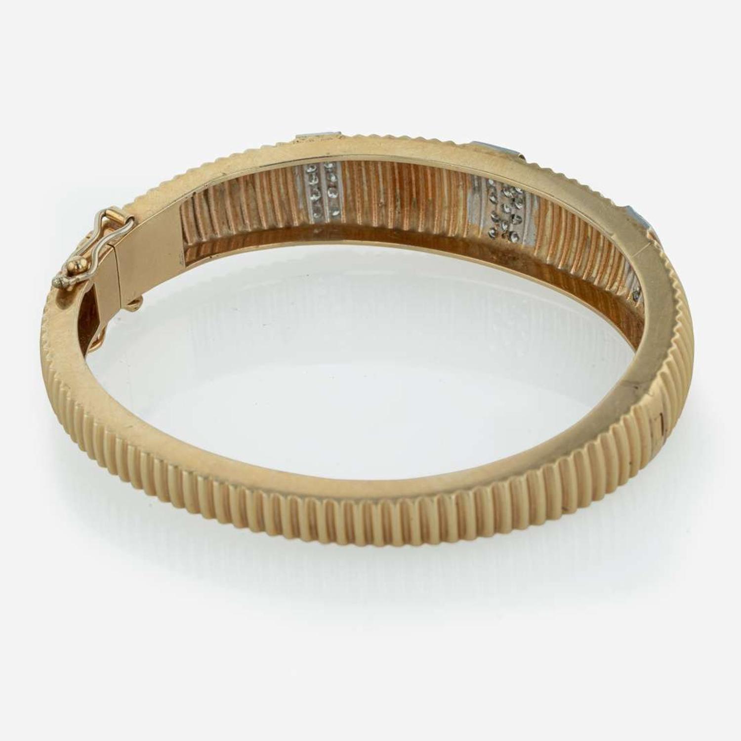 A 14K Yellow Gold and Diamond Bracelet