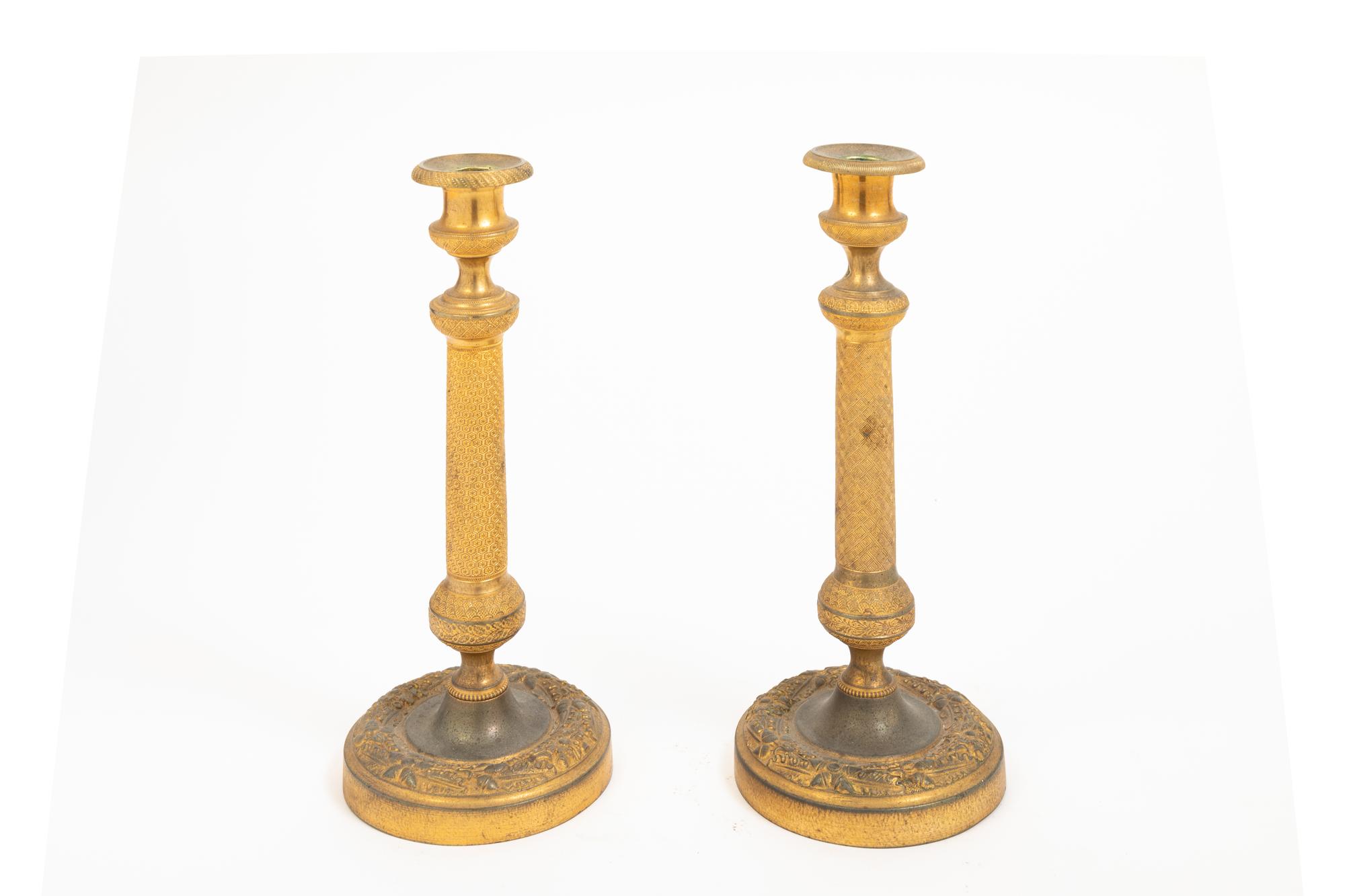 A Pair of Empire Style Gilt Bronze Candlesticks