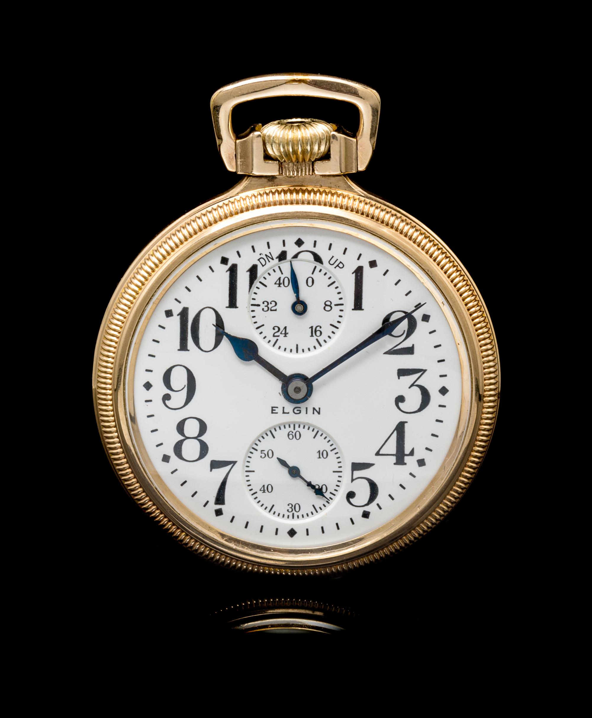 A Collection of Gold Filled Wind Indicator Railroad Open Face Pocket Watches, Elgin and Rockford,