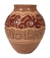 Red and Tan Carved Pottery Jar