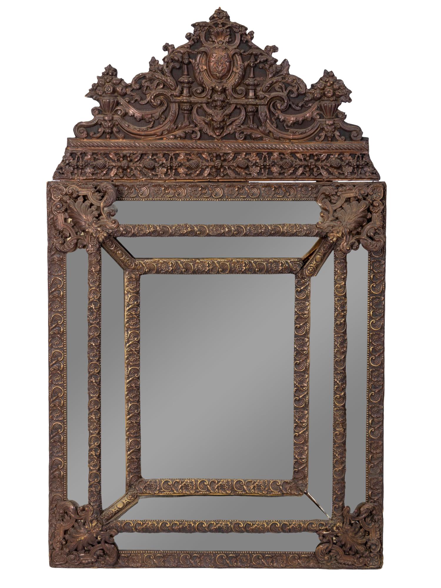 A Dutch Repousse Brass Cushion Mirror — 19TH CENTURY