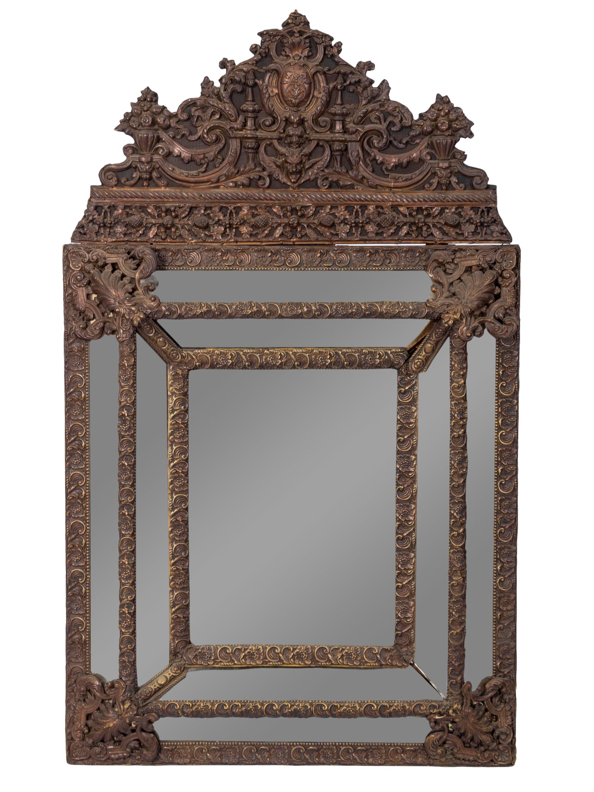 A Dutch Repousse Brass Cushion Mirror — 19TH CENTURY
