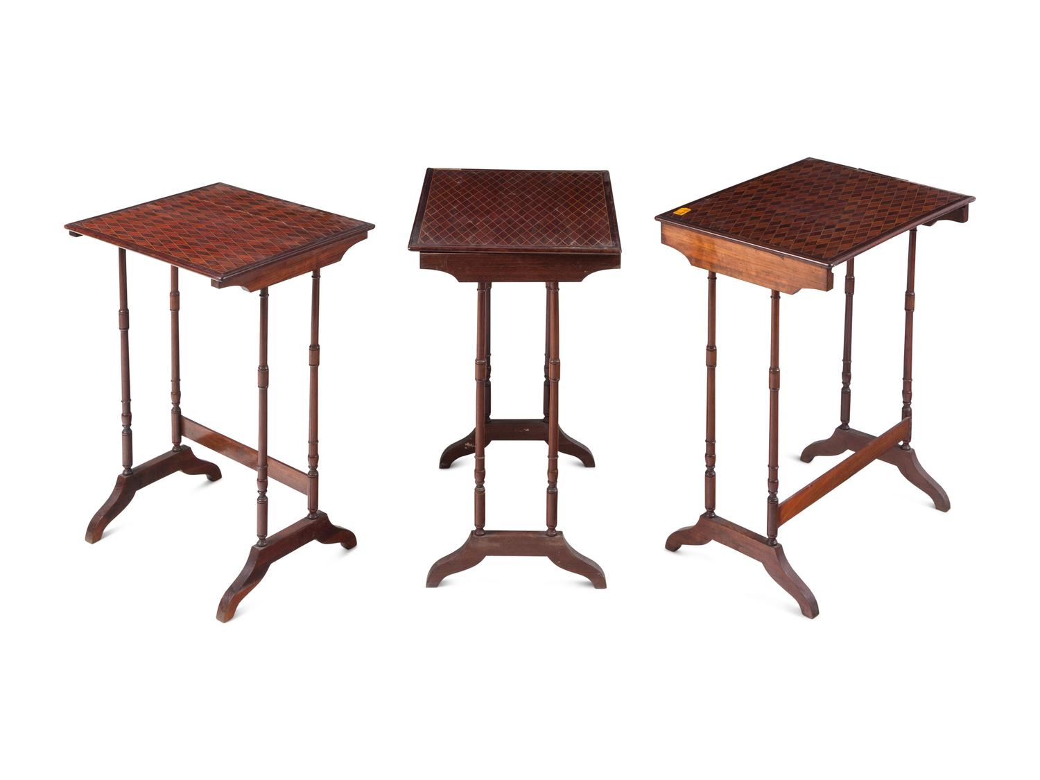 A Set of Three Regency Style Satinwood Inlaid Mahogany and Parquetry Nesting Tables