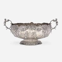 A Continental silver repoussé two-handled centerpeice Likely German, late 19th century
