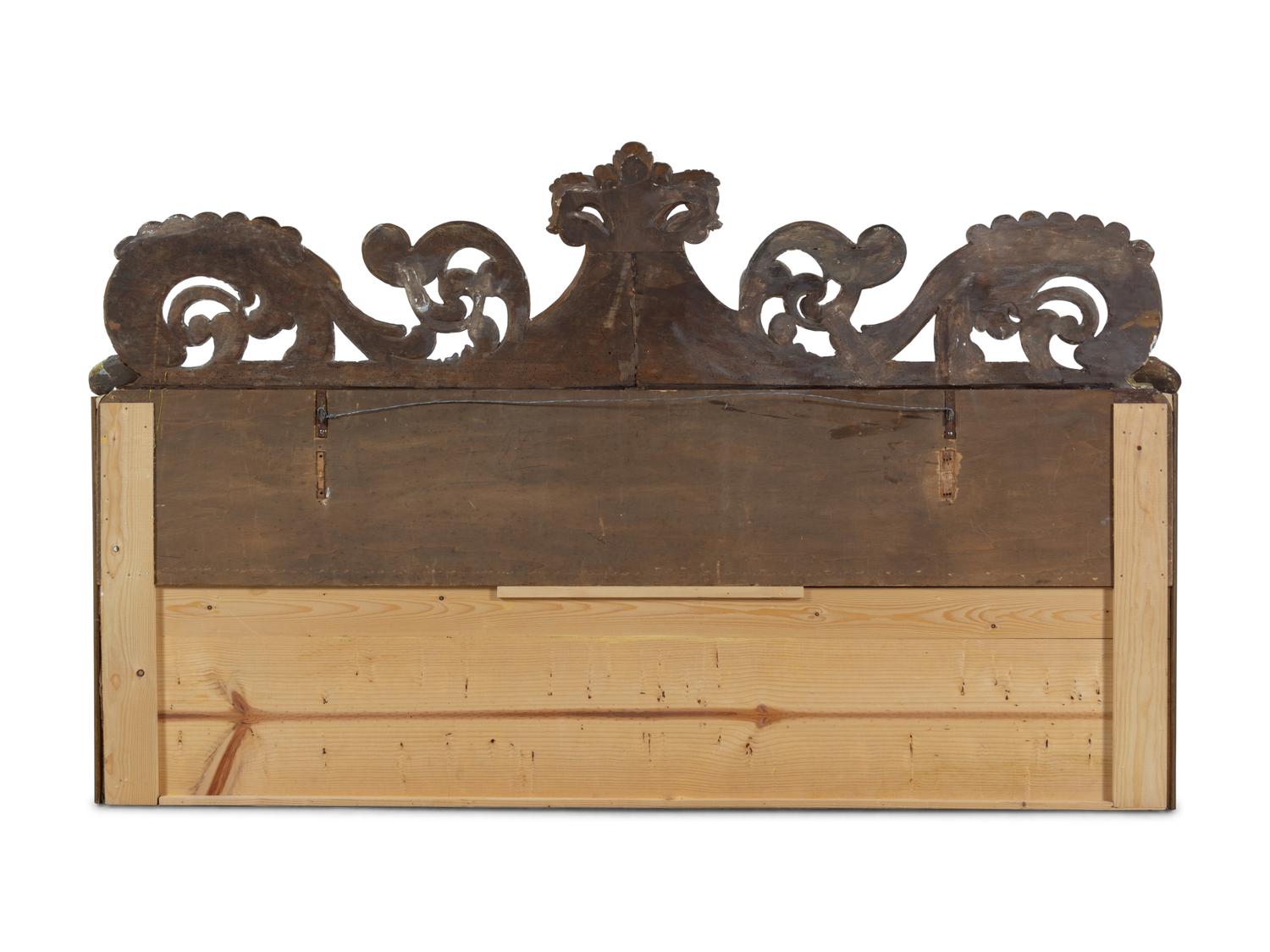 A Continental Carved and Parcel Gilt Wood Upholstered Headboard