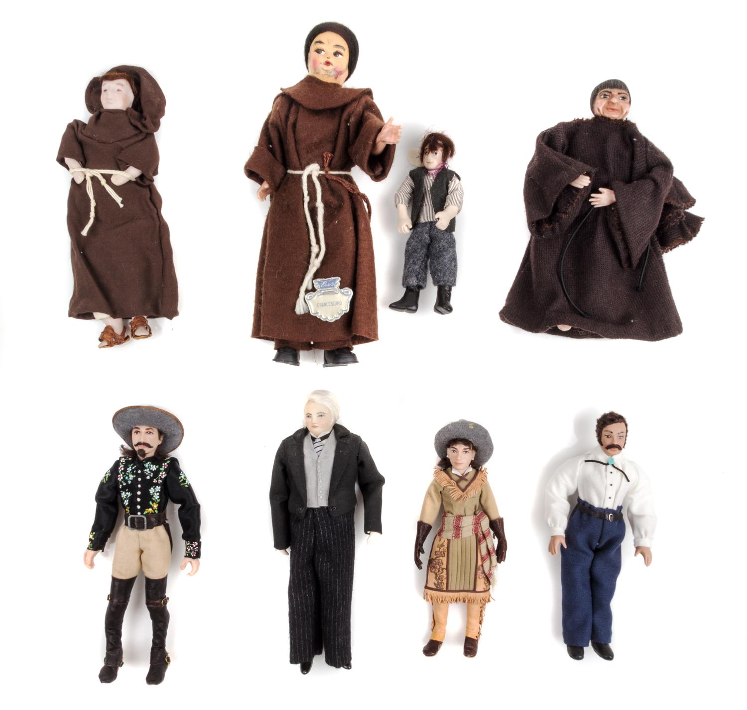 A Group of Seven Bisque Porcelain Dolls Height of tallest 7 3/8 inches.