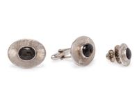 A 14 Karat White Gold and Black Star Sapphire Dress Set,
