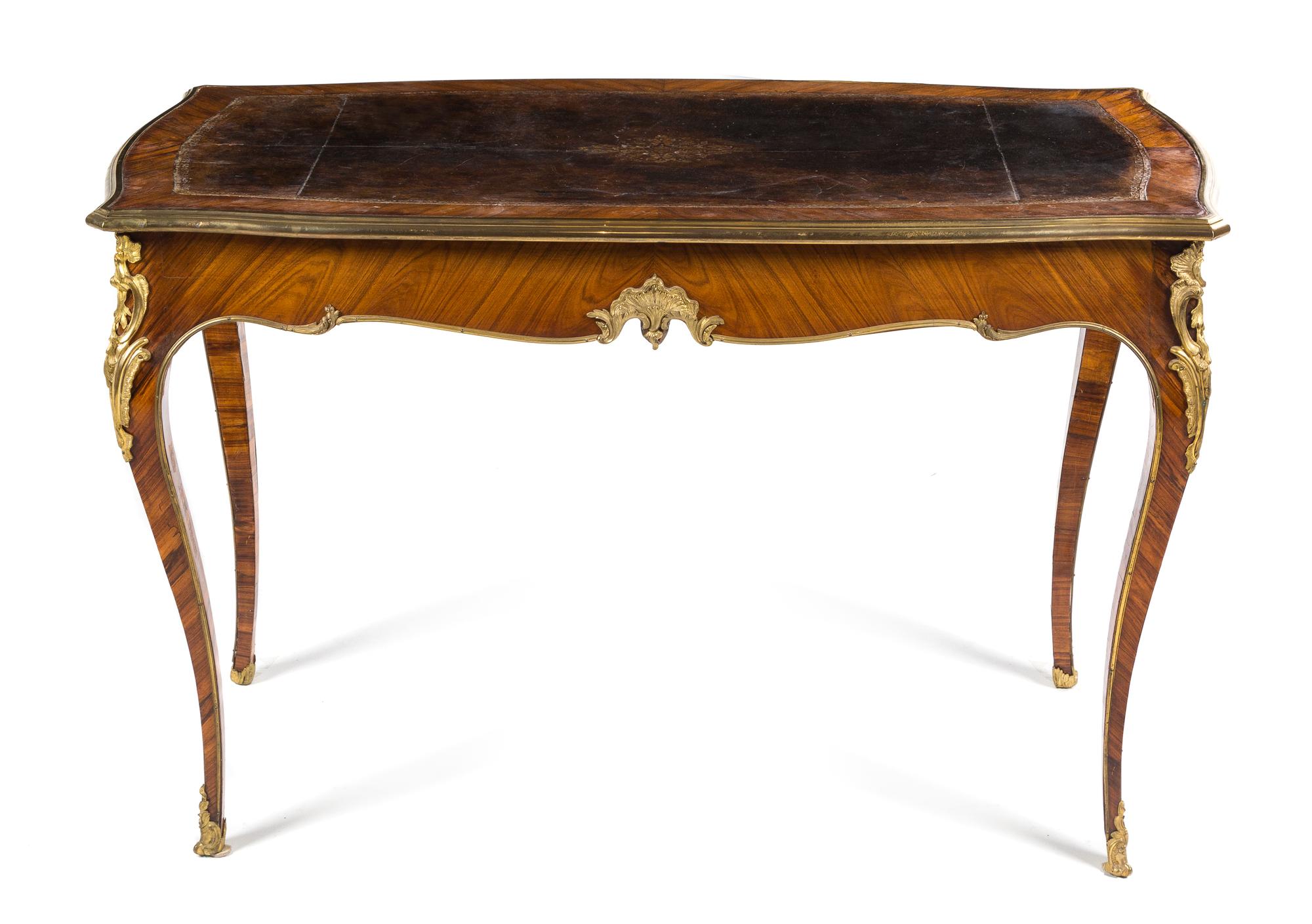 A Louis XV Style Gilt Bronze Mounted Kingwood Bureau Plat Height 29 3/4 x width 45 1/2 x depth 23 1/2 inches. — FRANCOIS LINKE, PARIS, CIRCA 1900