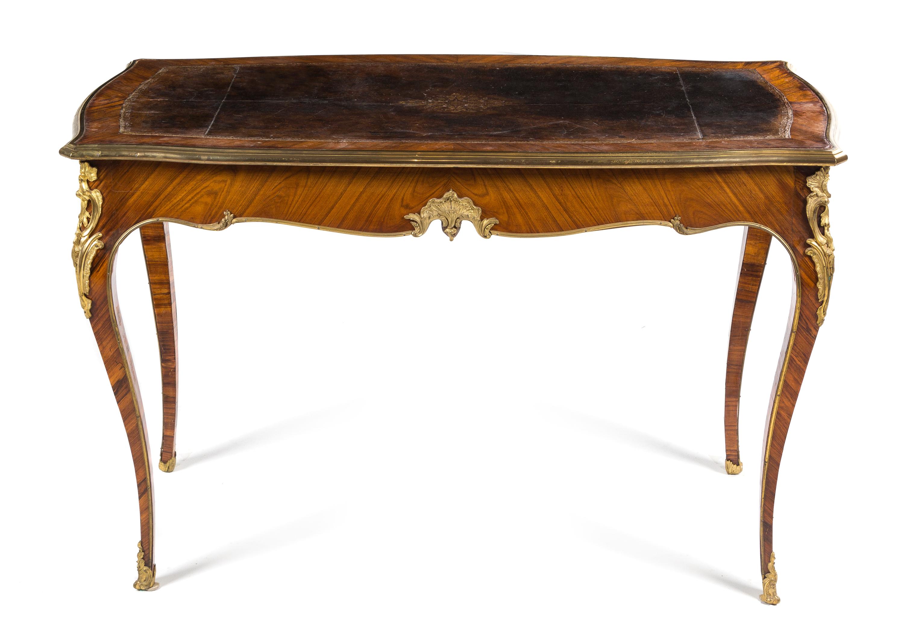 A Louis XV Style Gilt Bronze Mounted Kingwood Bureau Plat Height 29 3/4 x width 45 1/2 x depth 23 1/2 inches. — FRANCOIS LINKE, PARIS, CIRCA 1900