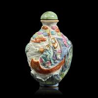 An Unusual Chinese Enameled Molded Porcelain Snuff Bottle, Qianlong Mark