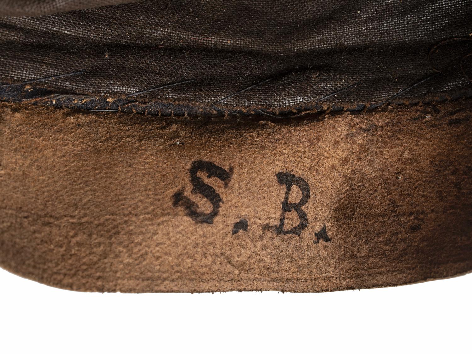 [CIVIL WAR]. A collection of items identified to brothers Robert and Samuel Burnside, Company H, 110th New York Infantry, comprised of a kepi and war-date photographs.