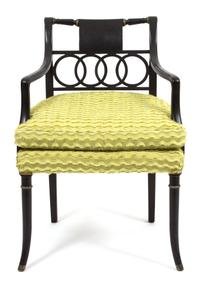 A Regency Style Ebonized Open Armchair Height 32 x width 22 x depth 22 inches.