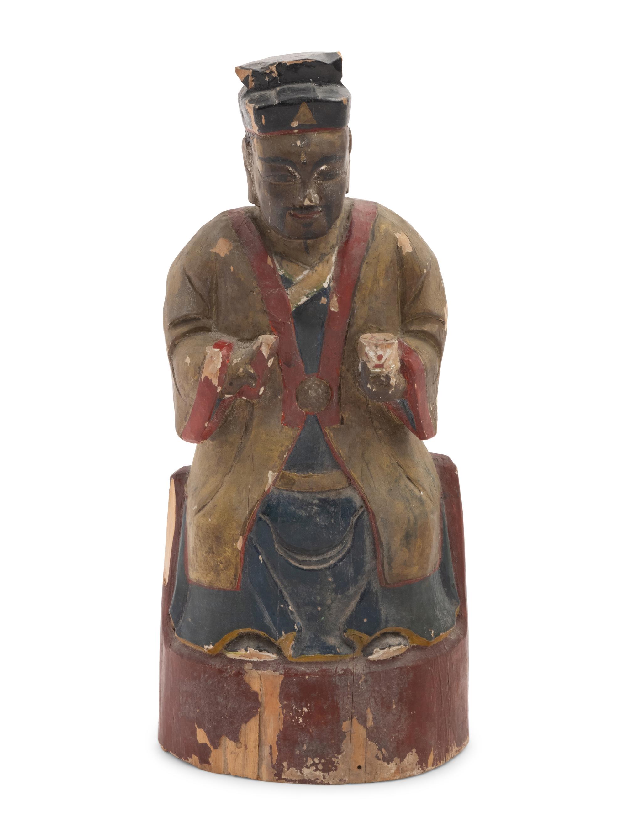 A Chinese Carved Polychrome Decorated Figure