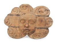 A Continental Carved Wood Face-Form Wall Plaque — 19TH CENTURY