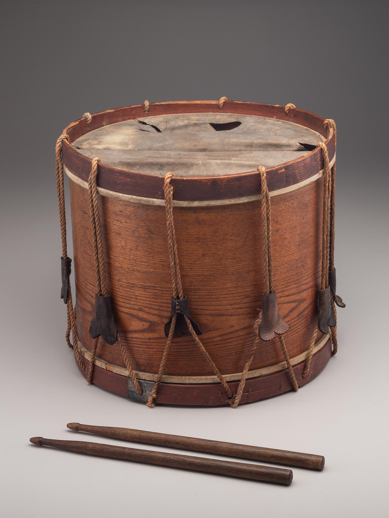 [MILITARIA]. Possibly Mexican War painted drum featuring ornate tack design, with drumsticks.