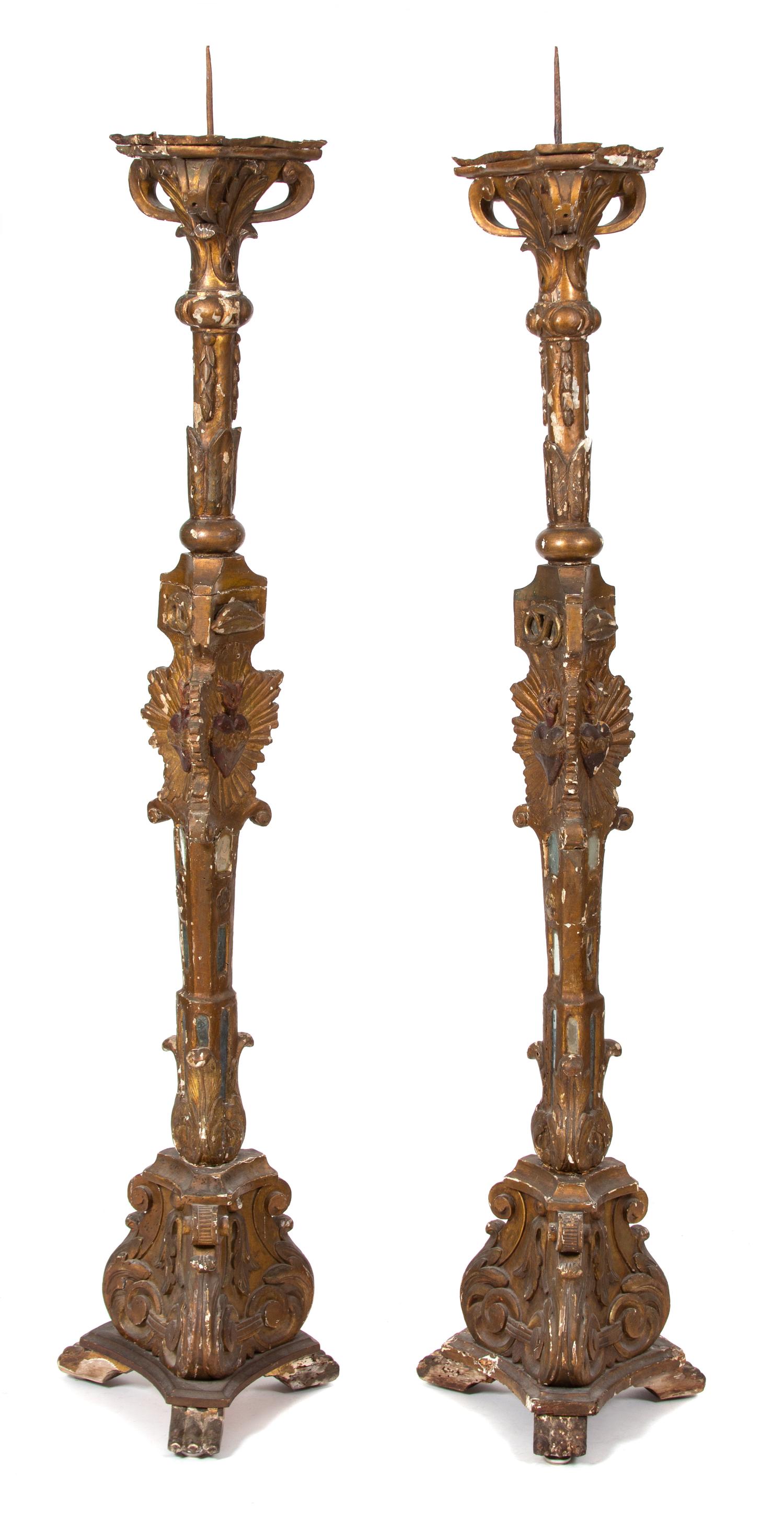 A Pair of Italian Giltwood and Mirrored Glass Torcheres Height 81 inches. — LATE 18TH CENTURY