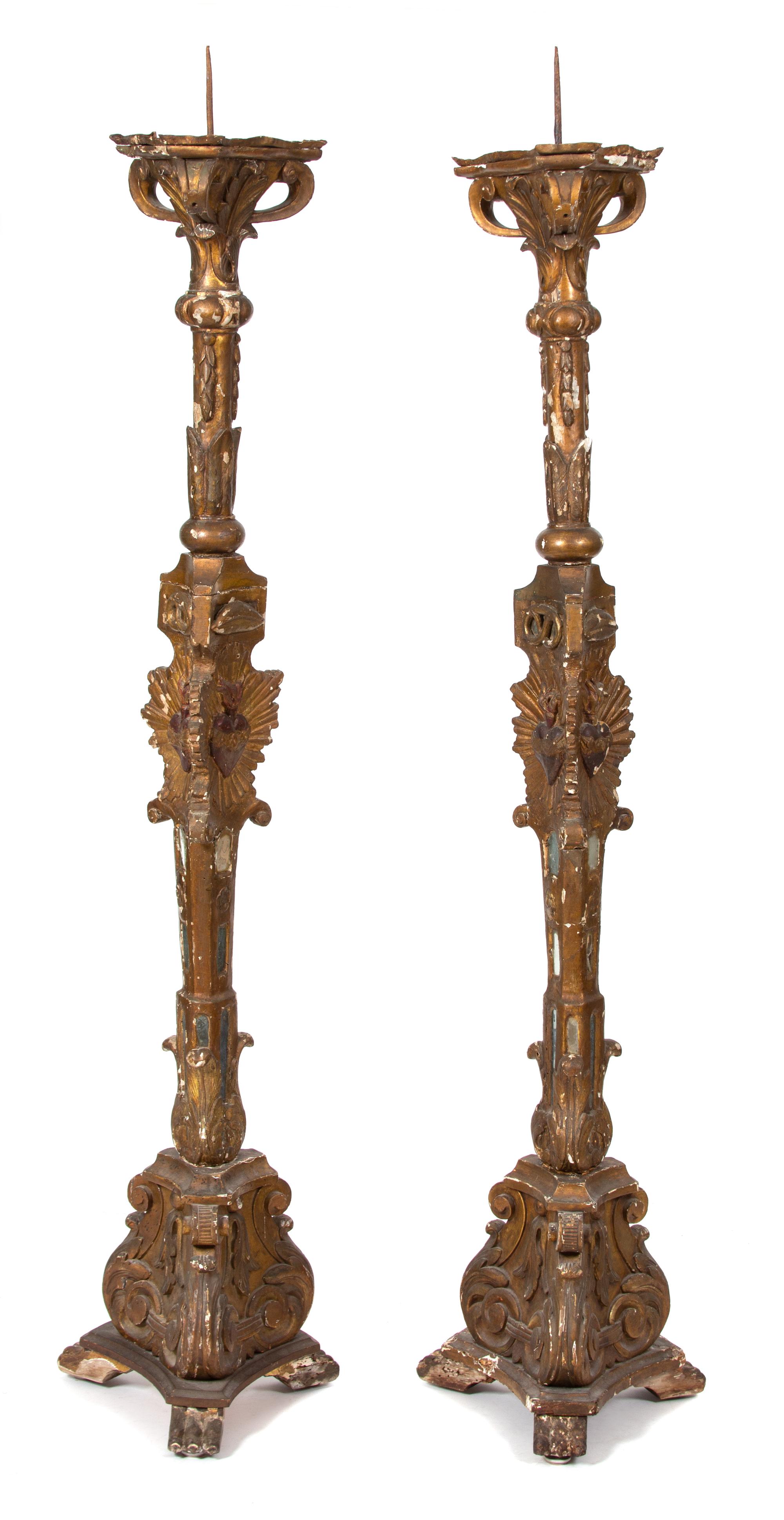 A Pair of Italian Giltwood and Mirrored Glass Torcheres Height 81 inches. — LATE 18TH CENTURY