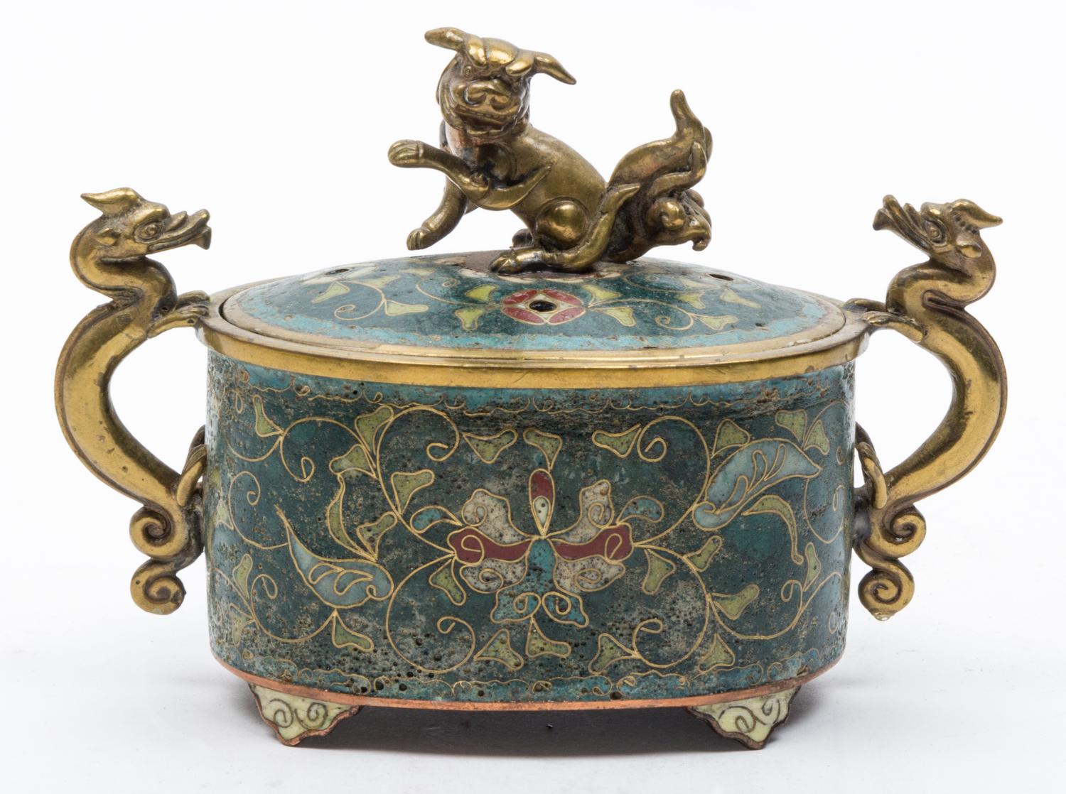A Cloisonne Enamel Oval Box and Cover Height overall 4 inches.