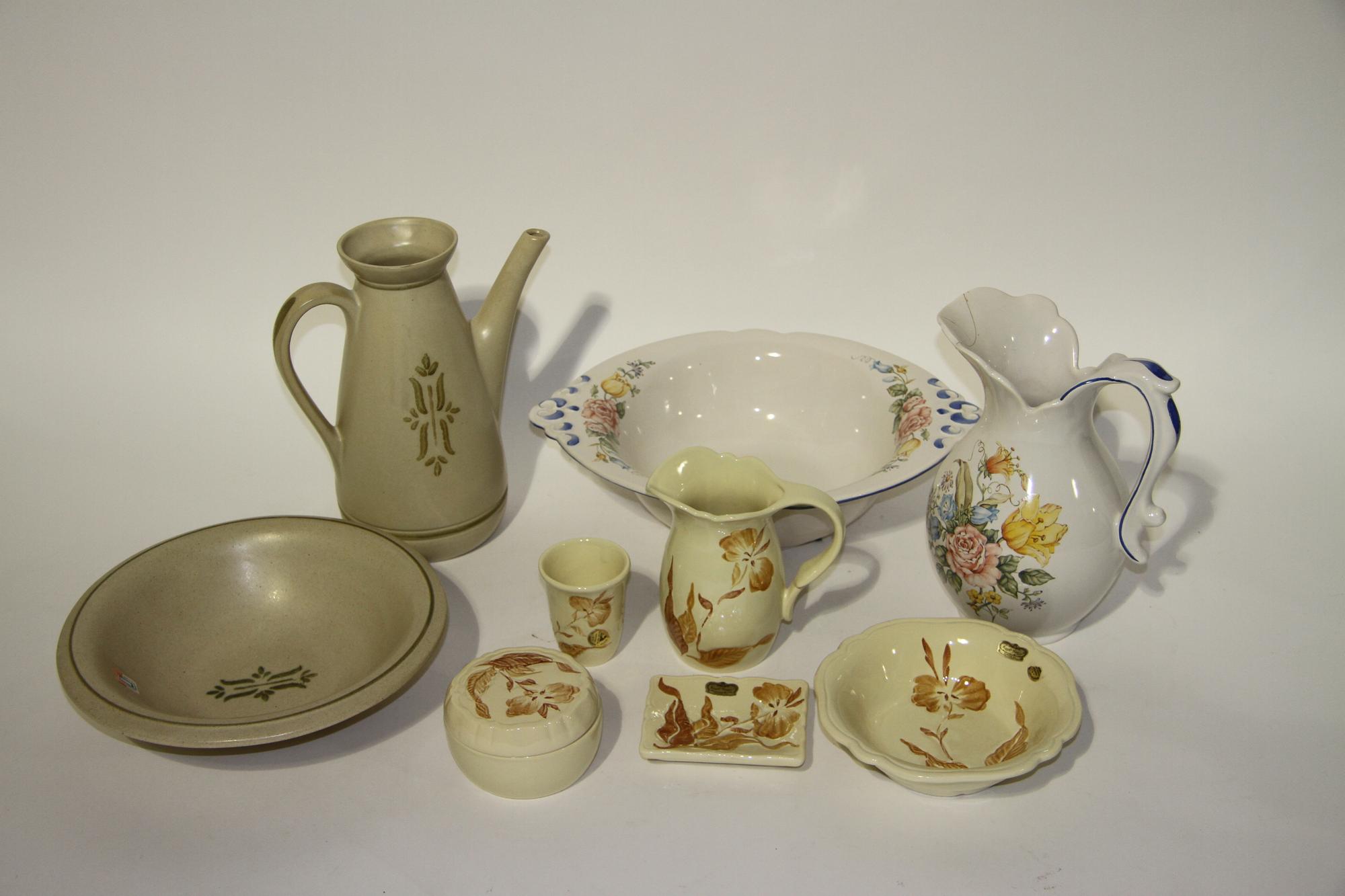 A Group of Nine Haeger Pottery Table Articles Height of tallest 11 1/2 inches.