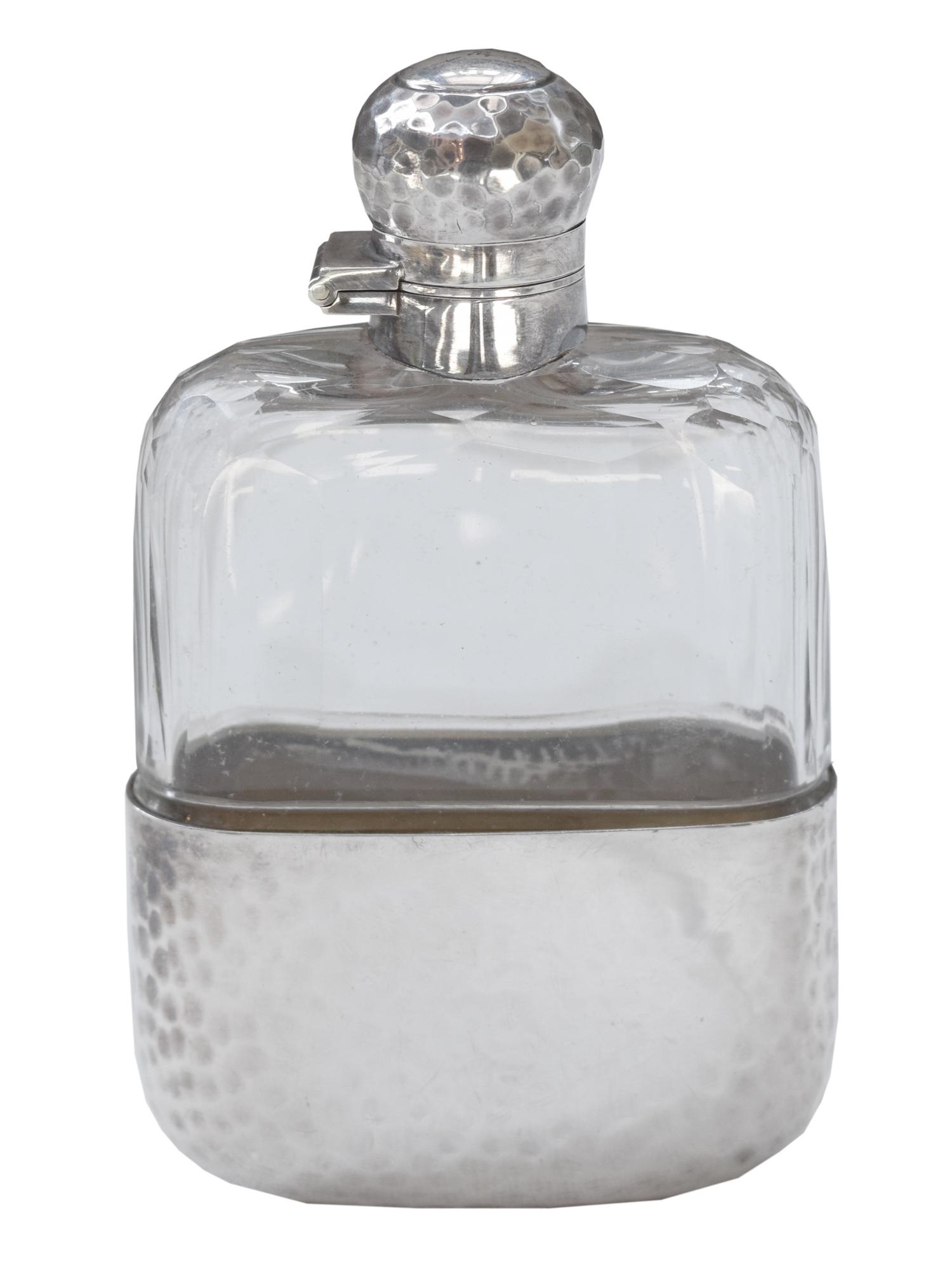 A James Dixon & Sons Hammered Silver and Glass Flask 2.5" W x 1" D x 4.5" H — England, Circa 1911