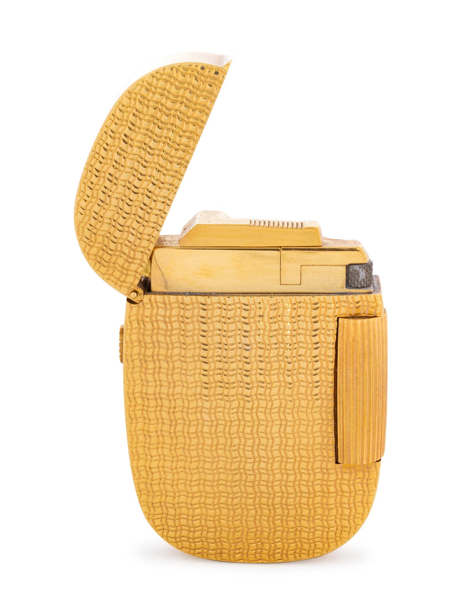 A Patek Philippe 18-Karat Yellow Gold Lighter
