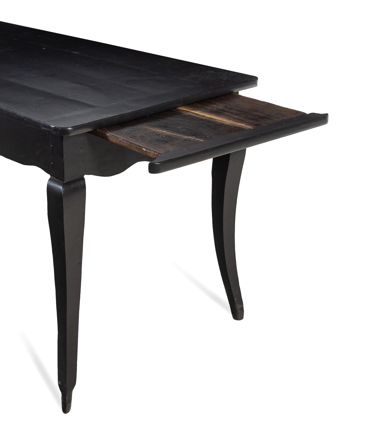 A Louis XV Provincial Ebonized Dining Table