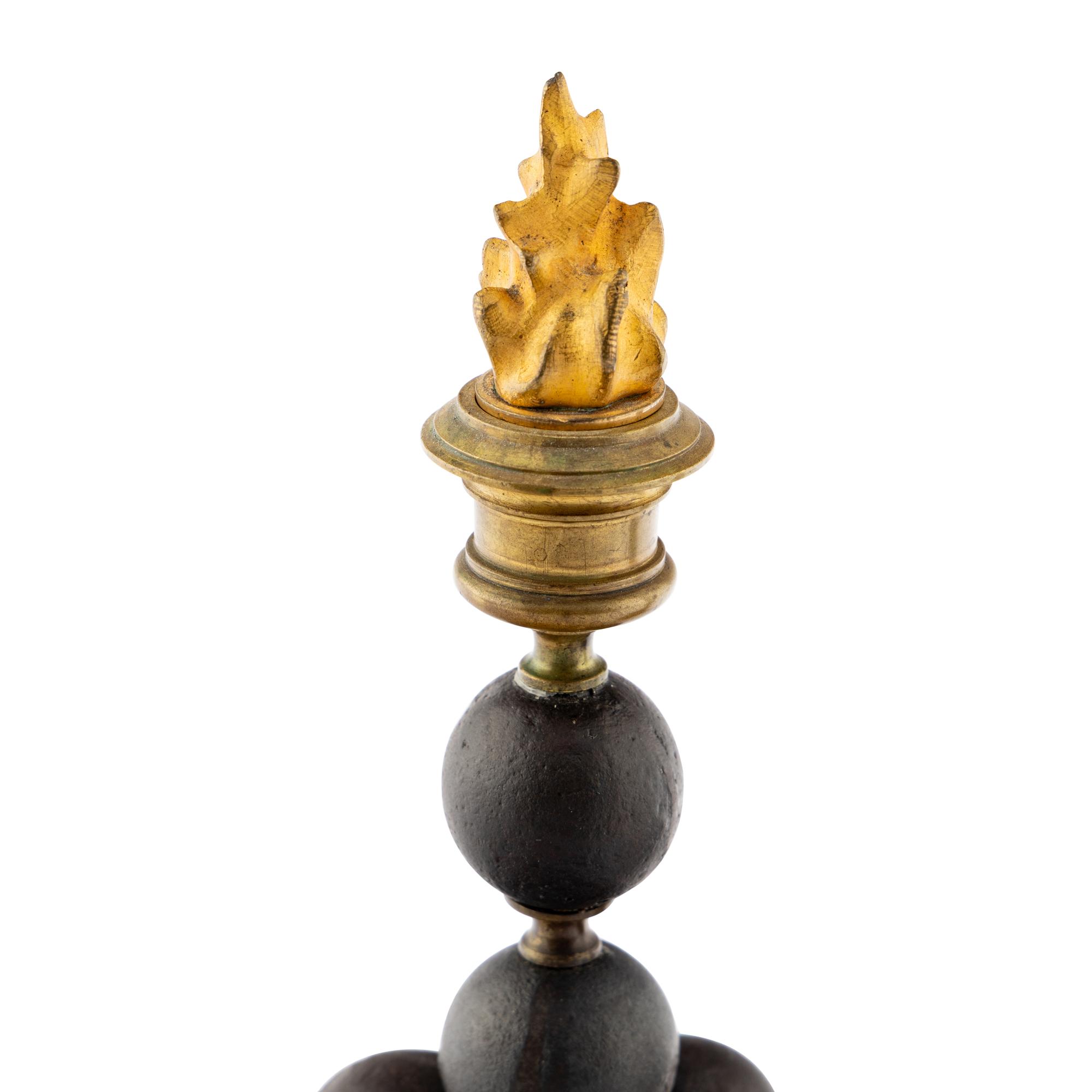 A Pair of French Gilt Bronze and Metal Candlesticks