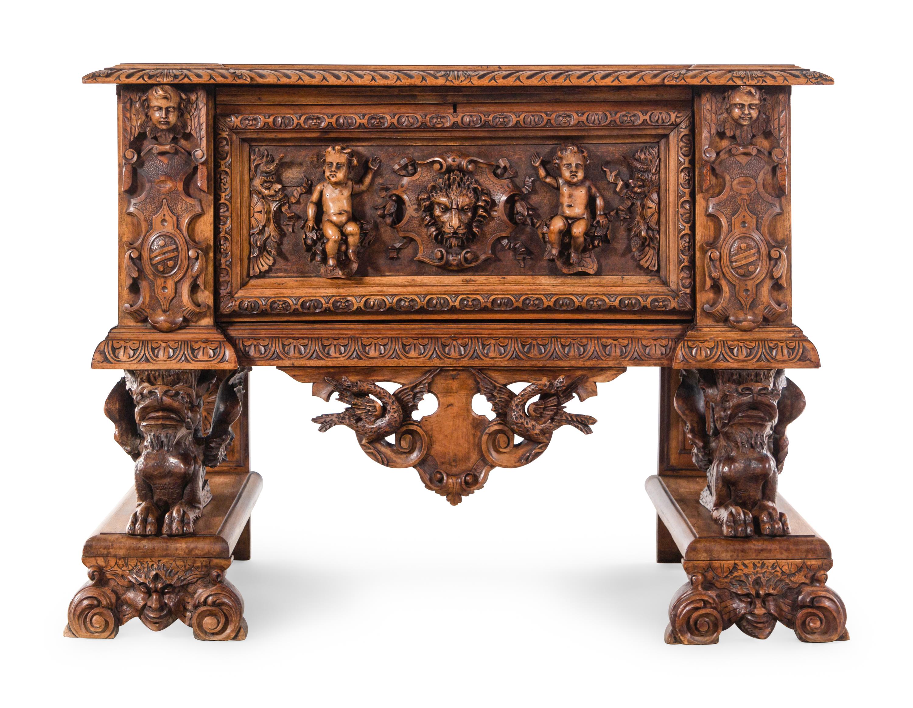 An Italian Renaissance Revival Carved Walnut Cassone on Stand