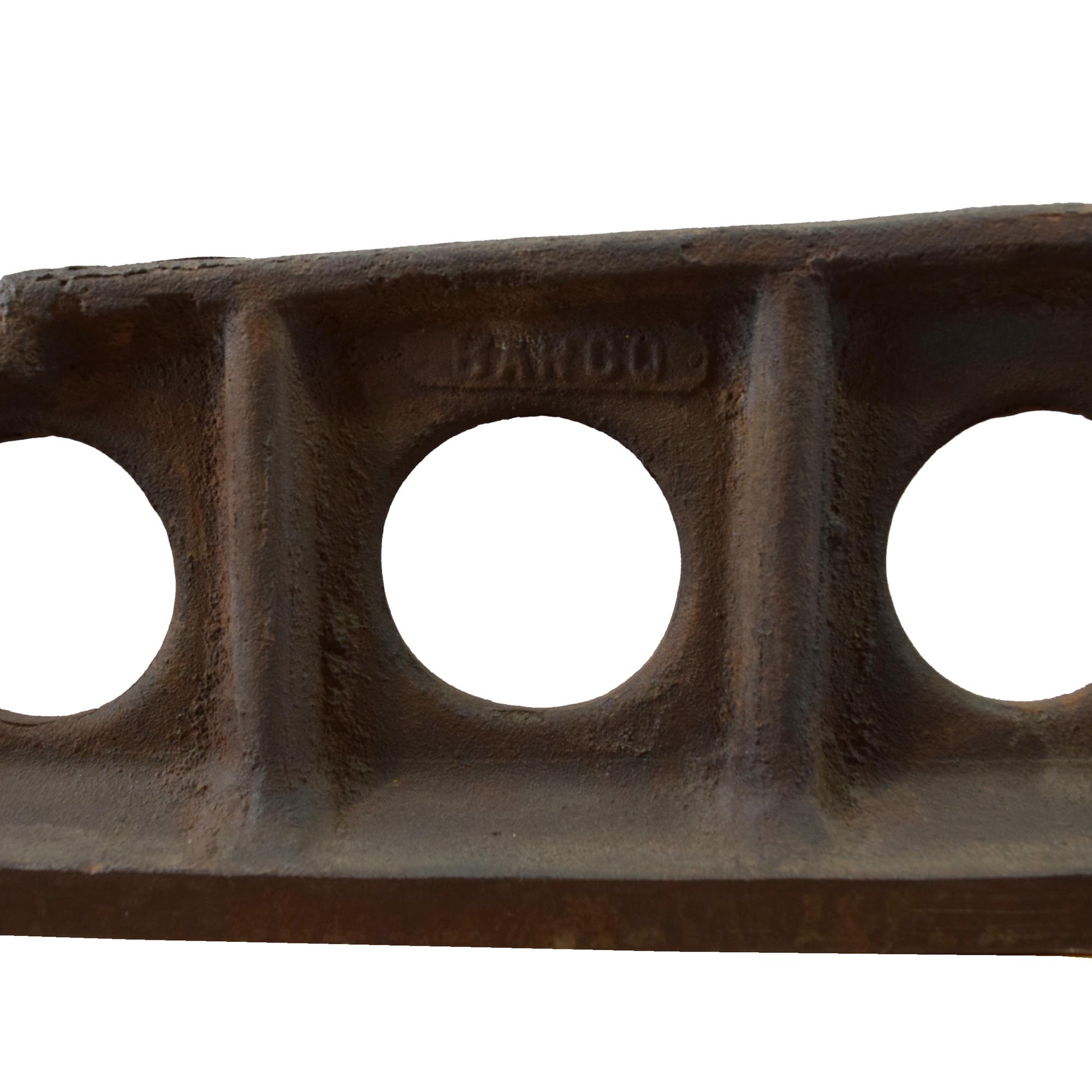 An Industrial Cast Iron Tool 61" W x 3" D x 7" H — United States, Circa 1900