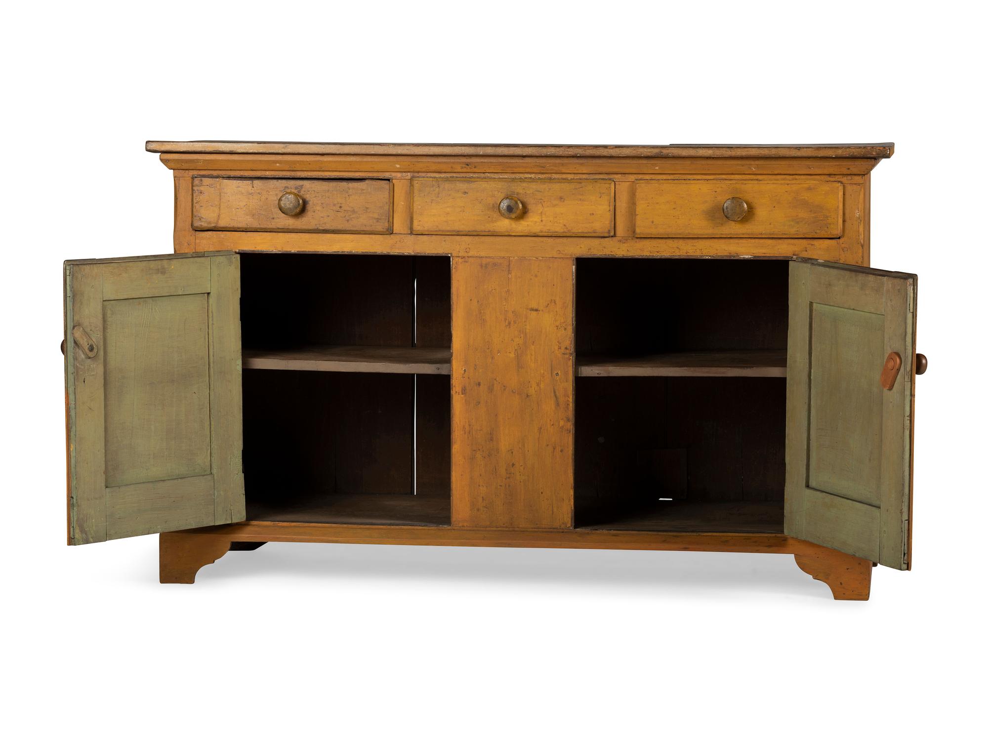 A Country Yellow Painted Pine and Poplar Cupboard