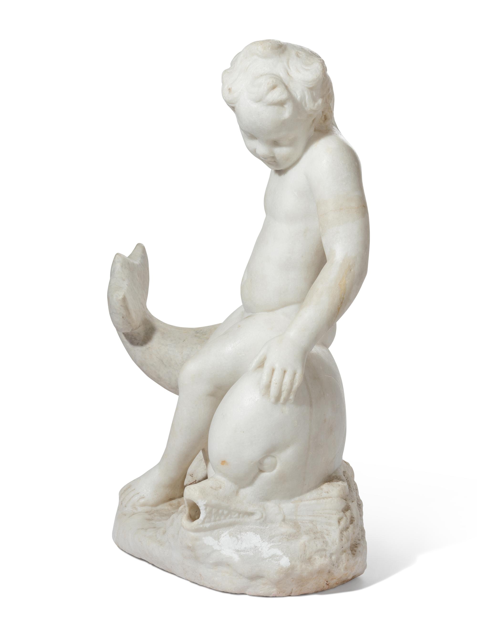 A Roman Marble Eros Riding a Dolphin