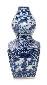 A Chinese Blue and White Gourd-Form Porcelain Vase Height 16 inches. — 20TH CENTURY