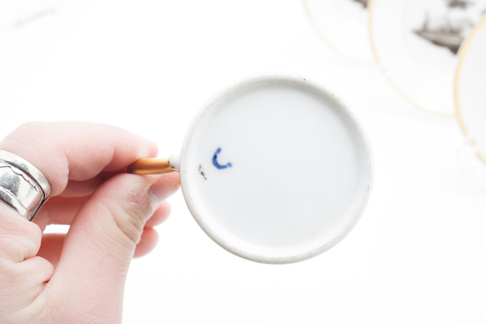 A Set of Five Russian Porcelain Cups and Six Saucers Diameter of saucer 5 inches. — GARDNER