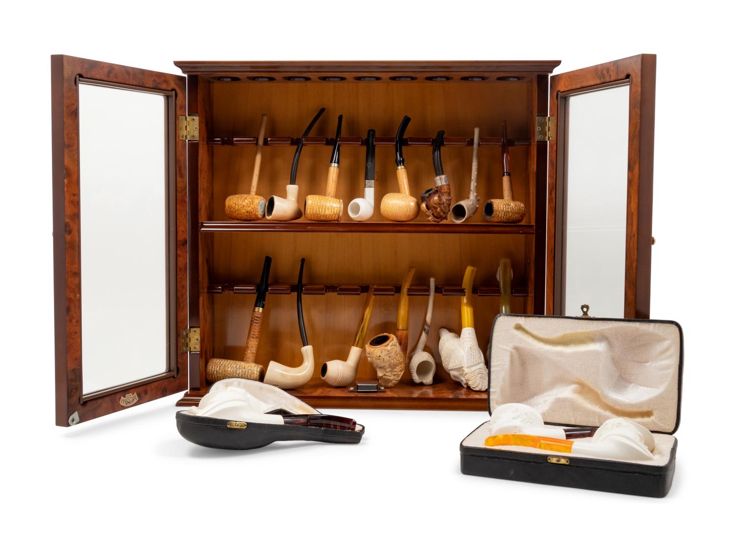 A Collection of Carved Briar Smoking Pipes