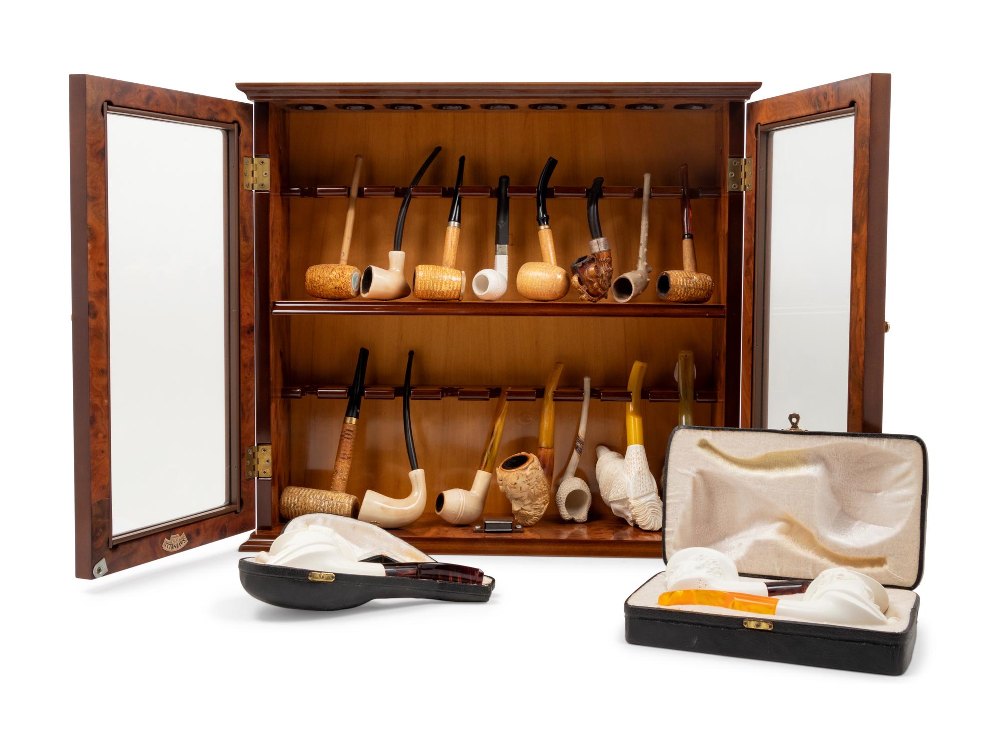 A Collection of Carved Briar Smoking Pipes