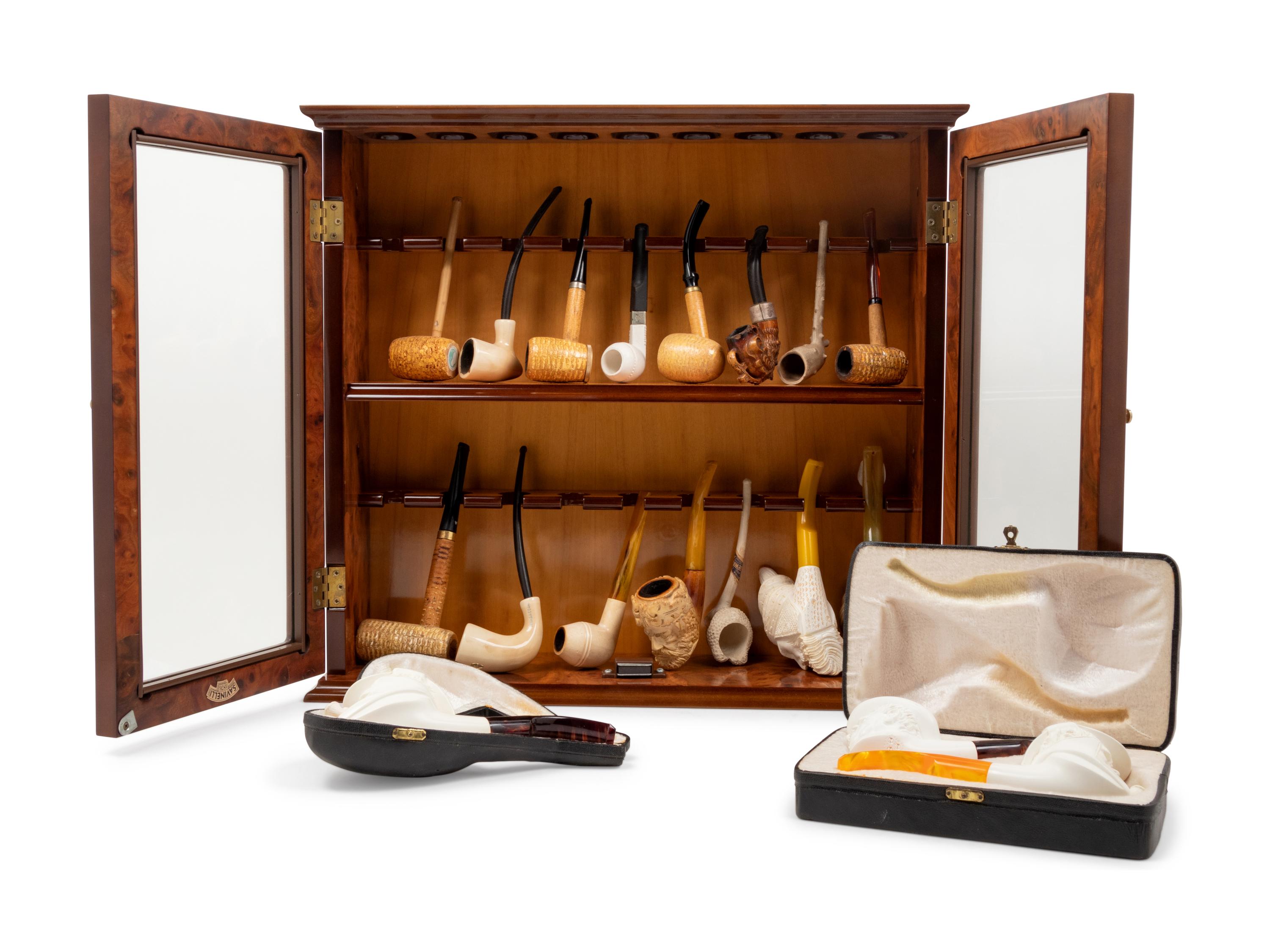 A Collection of Carved Briar Smoking Pipes