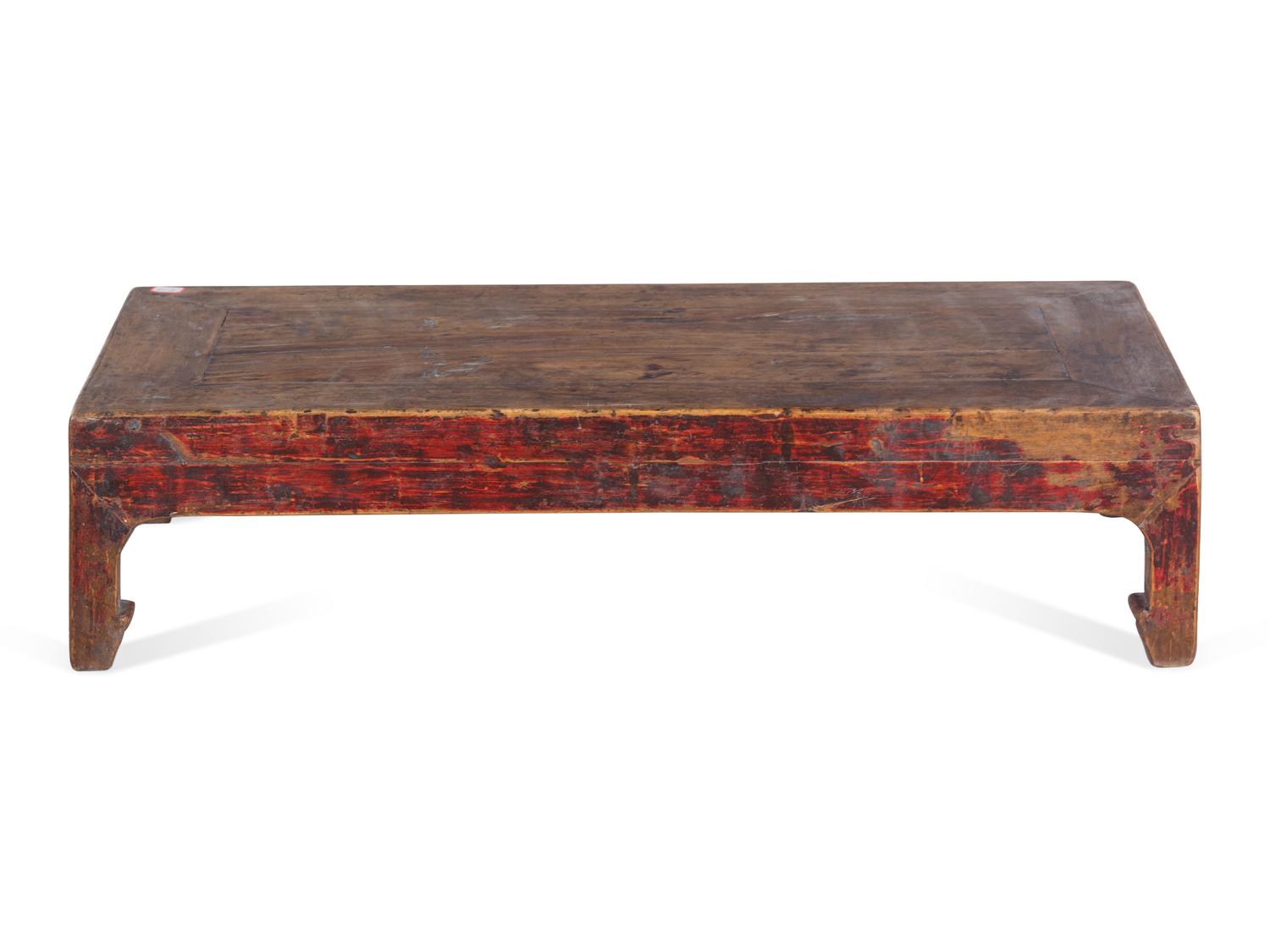A Chinese Carved Low Table with Old Paint Remnants in Red
