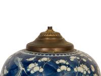 A Japanese Blue and White Porcelain Cracked Ice Jar