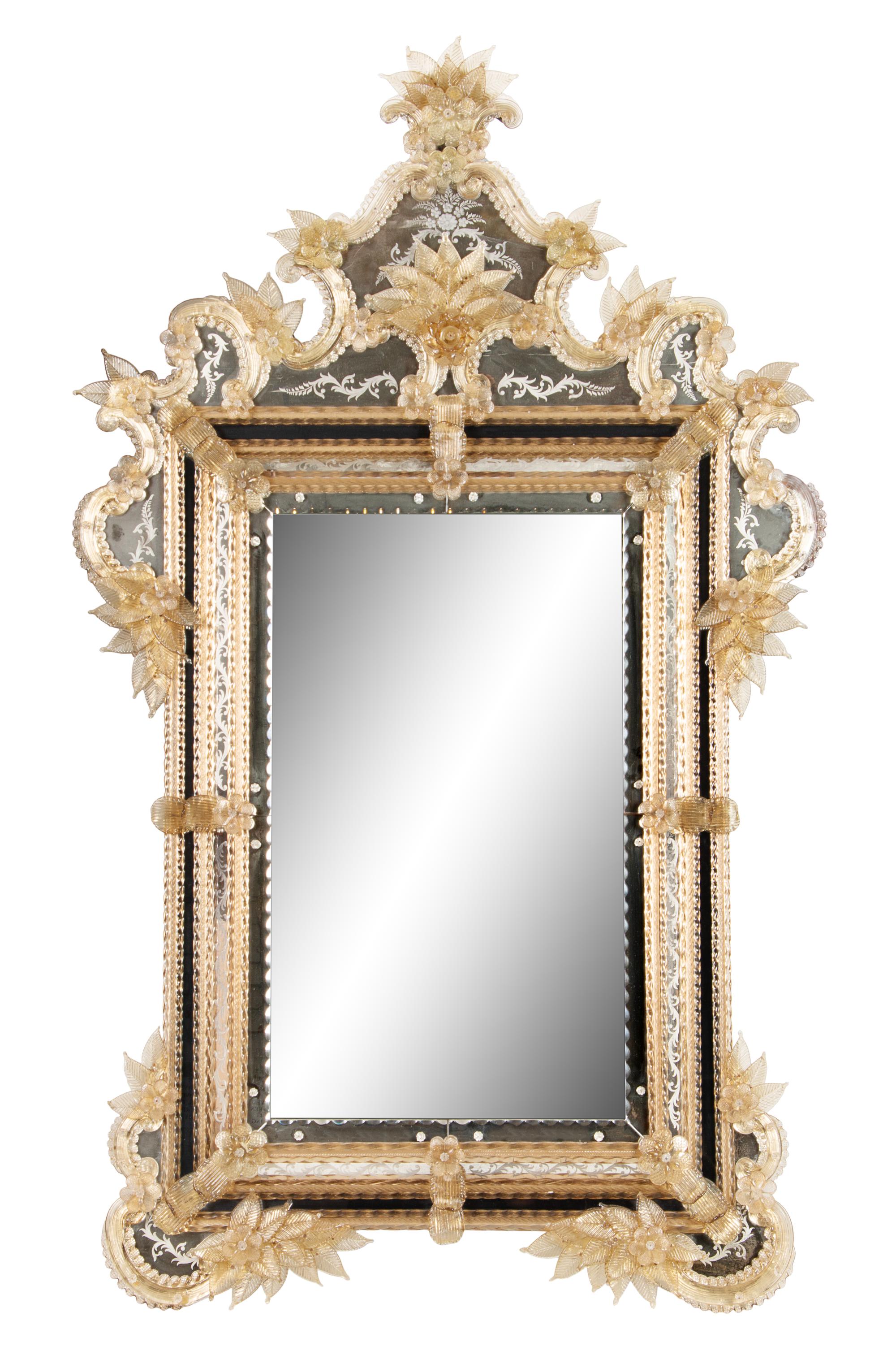 A Venetian Molded Glass Mirror