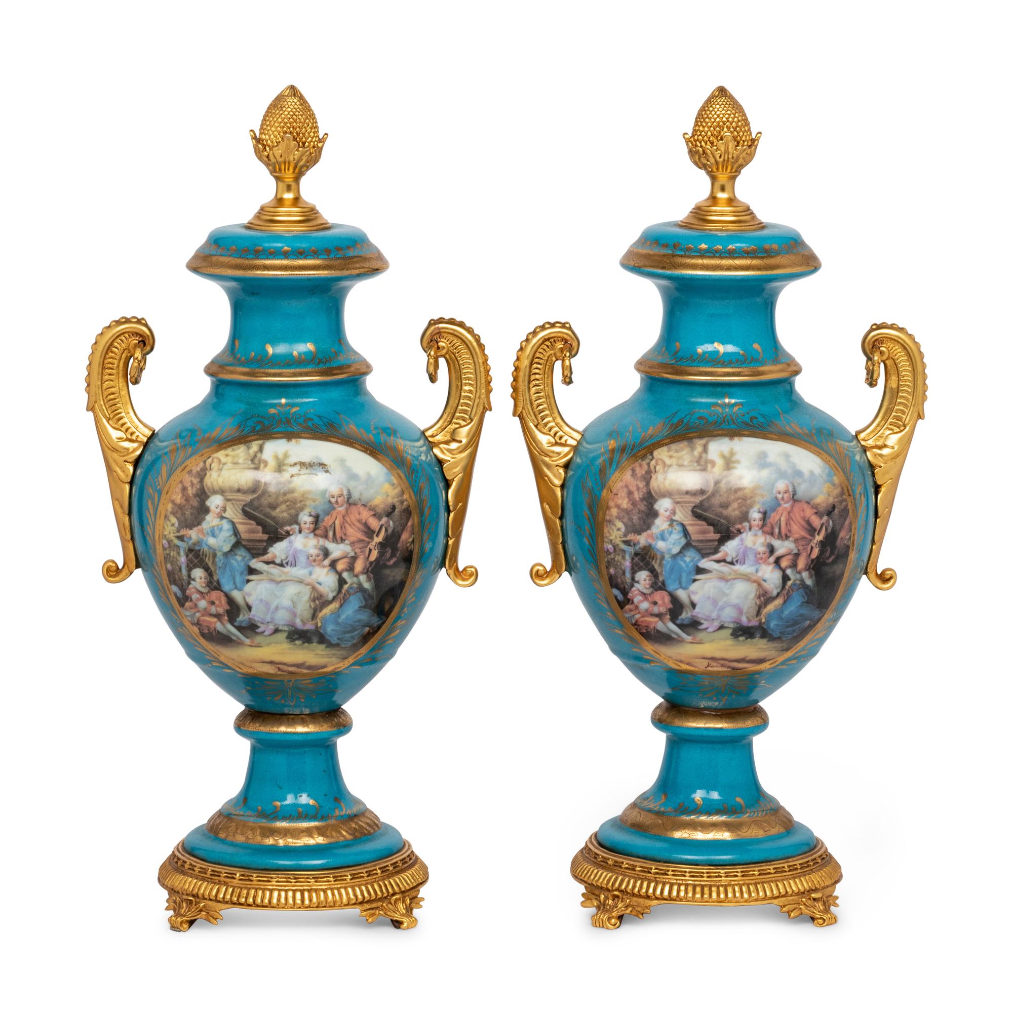A Pair of Sèvres Style Porcelain Urns