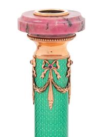A Carved Hardstone, Enamel, 14-Karat Gold and Hardstone Mounted Three-Piece Clock Garniture
